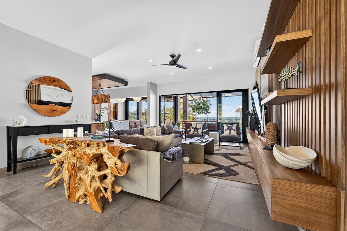 Bright Costa Rica villa living space with natural wood details