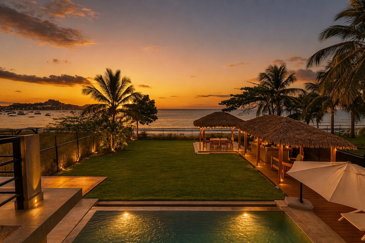 Costa Rica villa lawn and ocean sunset
